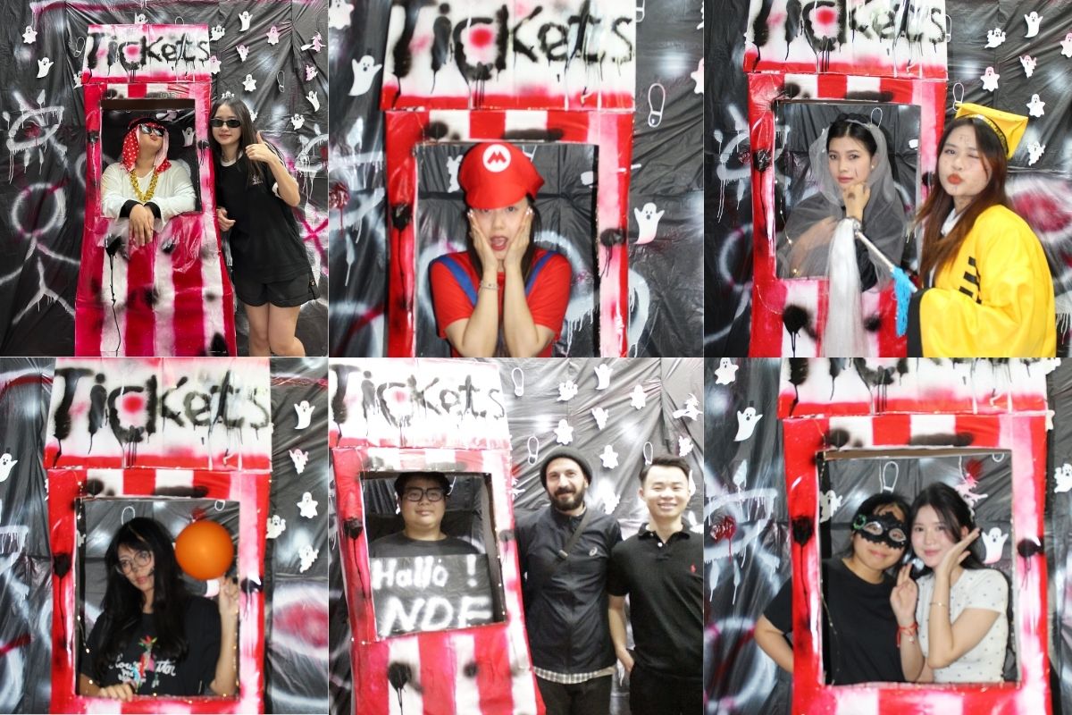 Học viên check-in tại booth trang trí Halloween ở trung tâm tiếng Đức NDF Hà Nội